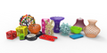 a variety of colorful 3D printed objects, including vases, bowls, and other decorative items, arranged on a white background.